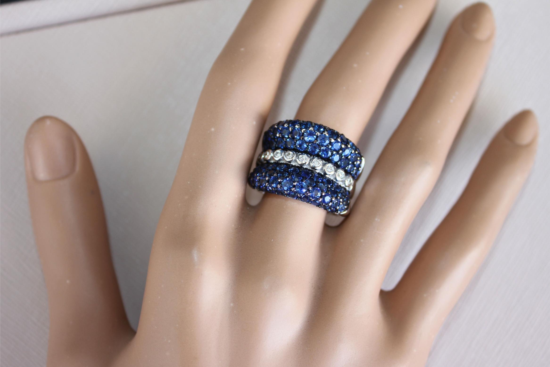 Round Diamond Bezel Set Blue Sapphire Pave Set 18 Karat White Gold Unique Ring