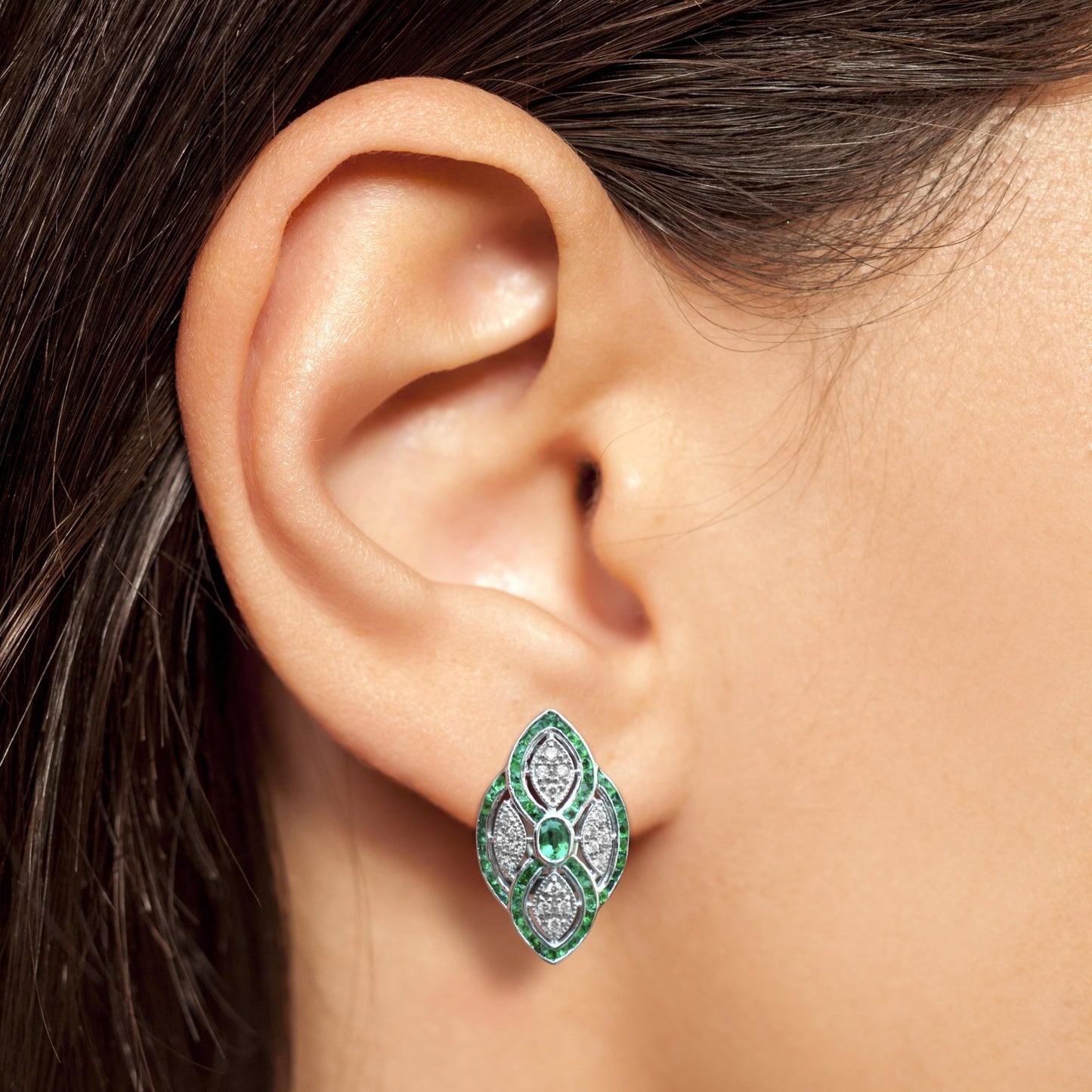 green emerald & diamond curve art deco inspired omega back white gold earrings