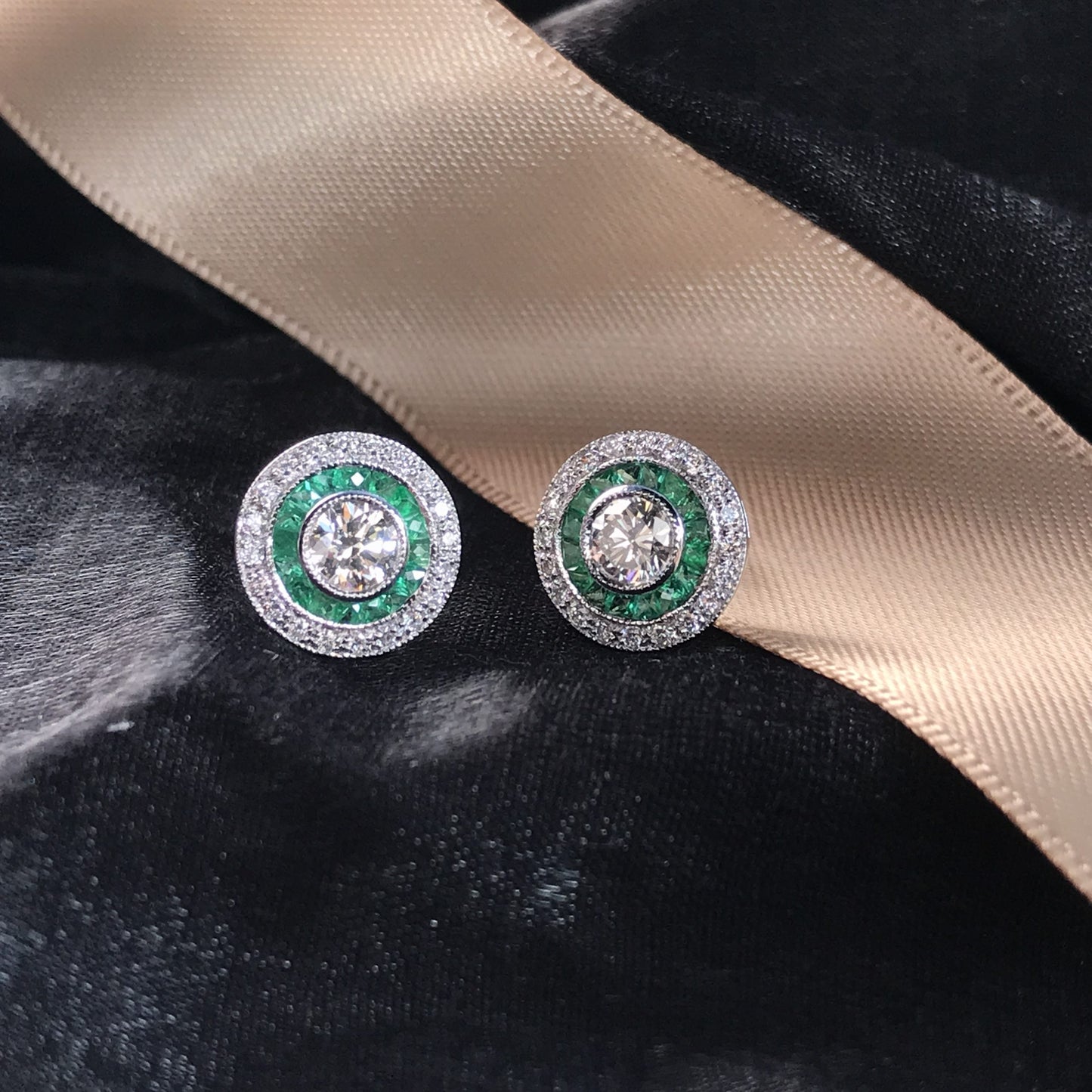 4.4mm round diamond & emerald invisible set double halo stud white gold earrings