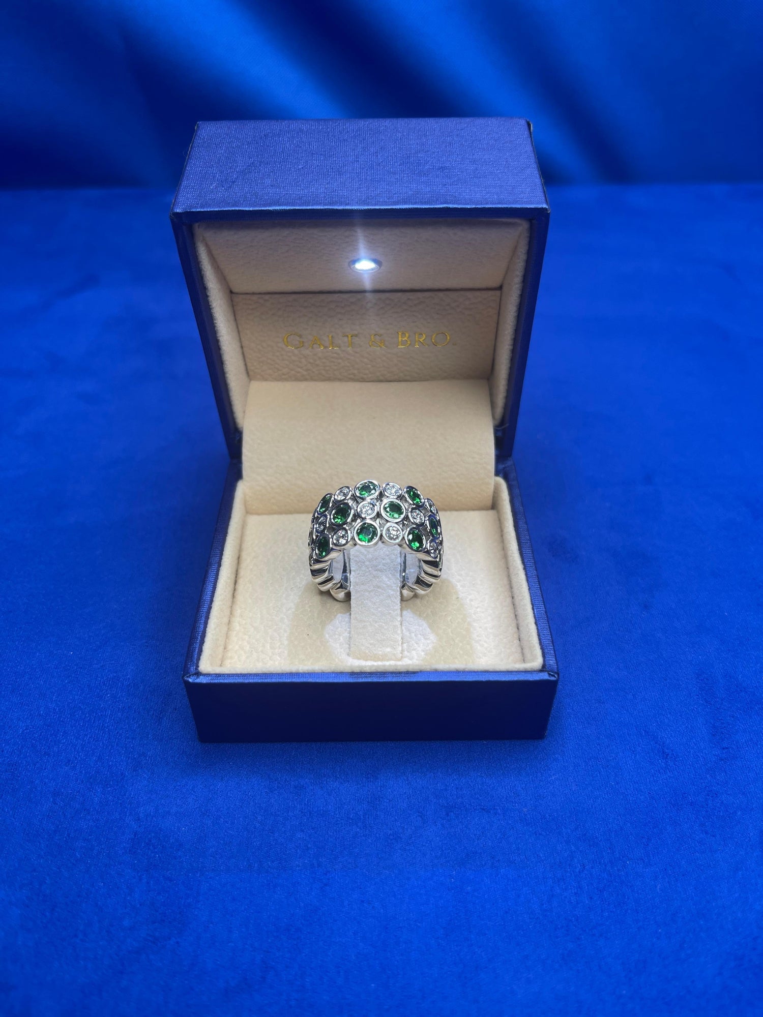 Green Tsavorite Diamond Flexible Bezel Eternity Band 18 Karat White Gold Ring