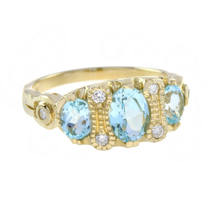 Oval Shape Blue Topaz & Diamond Vintage Style Three Stone 9K Yellow Gold Ring