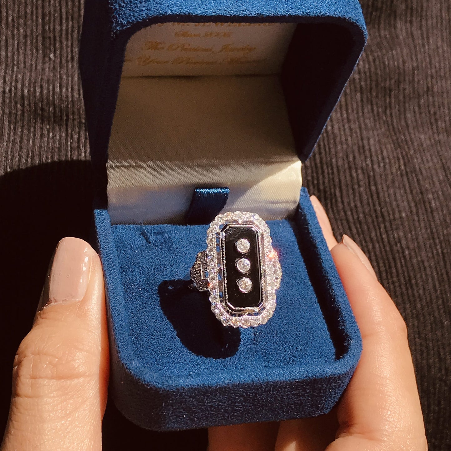 art deco style diamond & black onyx shield halo set white gold ring
