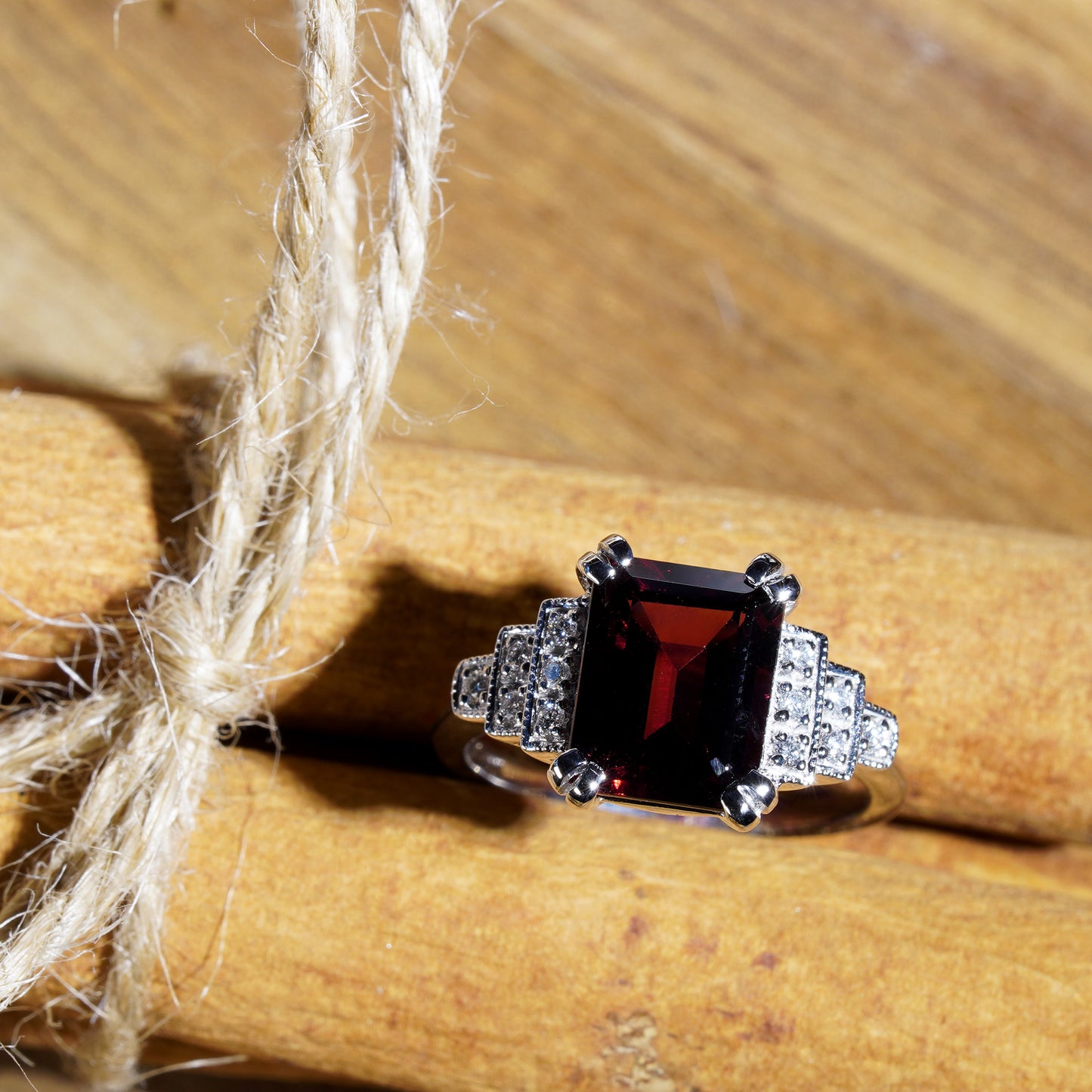 rectangle emerald cut red rhodolite & diamond step shoulder 14k white gold ring