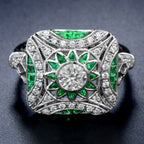 2.77 карат өлшемді Art Deco стиліндегі жасыл изумруд және гауһар тасты платина сақинасы