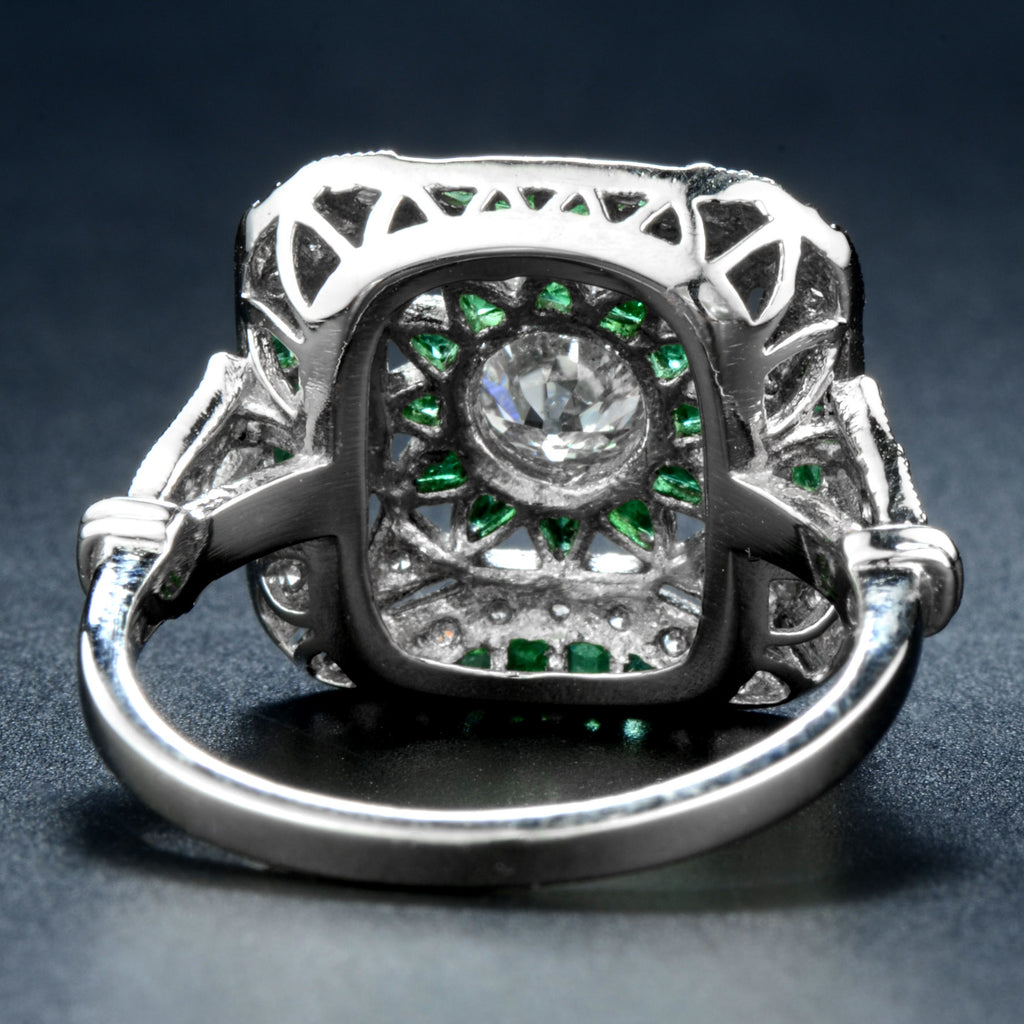 2.77 карат өлшемді Art Deco стиліндегі жасыл изумруд және гауһар тасты платина сақинасы