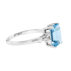 Octagon Emerald Cut Blue Topaz & Baguette Diamond Solitaire 14K White Gold Ring