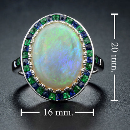 White Oval Cabochon Opal with Emerald & Sapphire Fancy Halo Set White Gold Ring