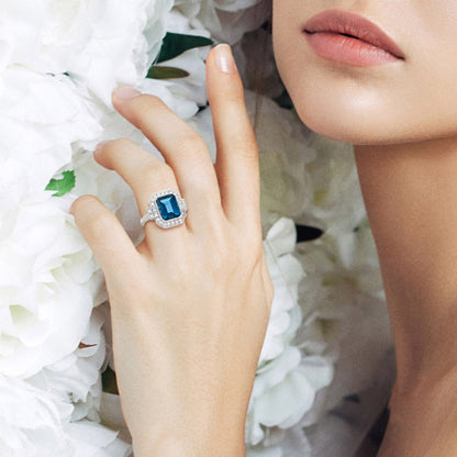 Rectangle Emerald Cut London Blue Topaz &amp; Diamond Halo Engagement Platinum Ring