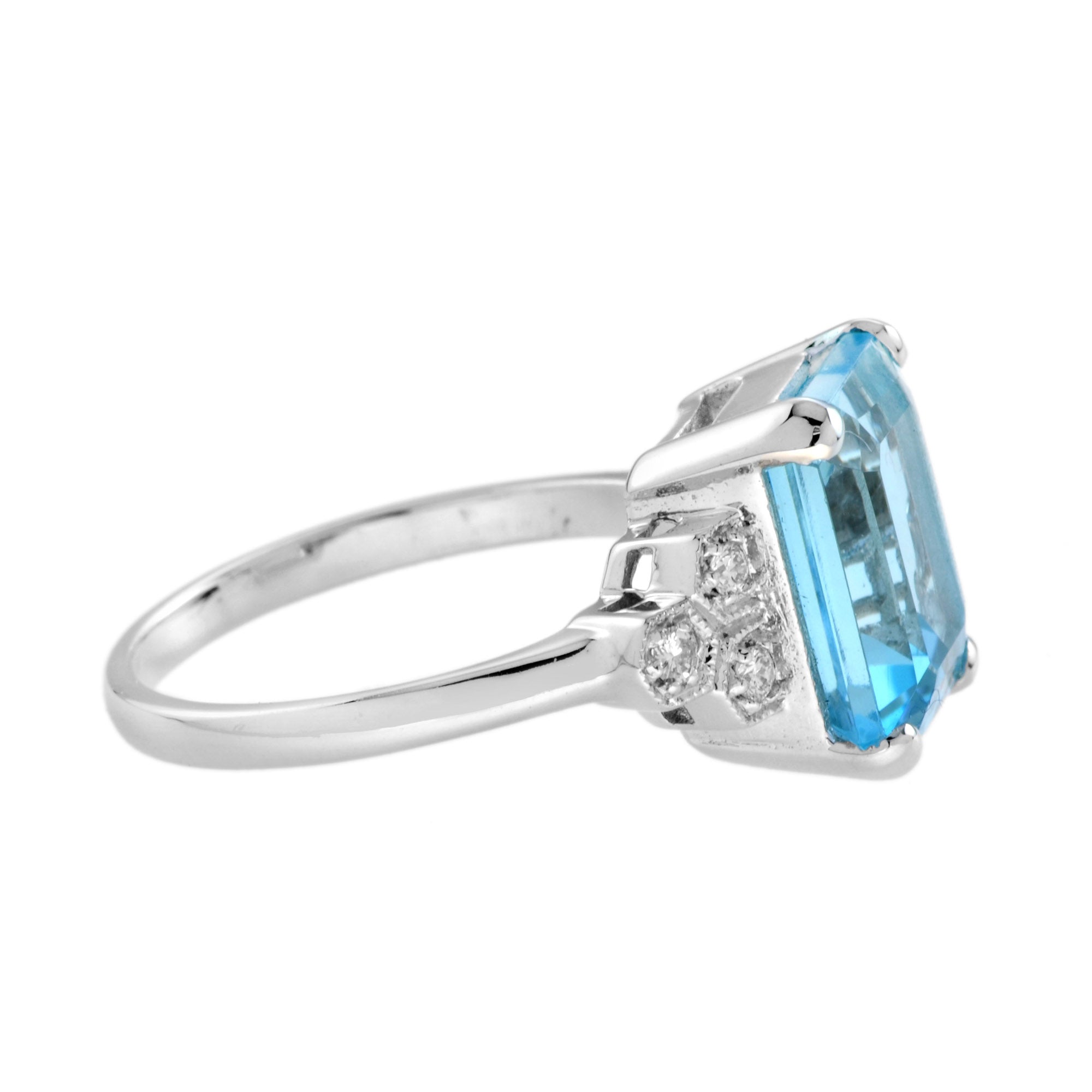 Emerald Cut Blue Topaz &amp; Diamond Solitaire 9K White Gold Ring