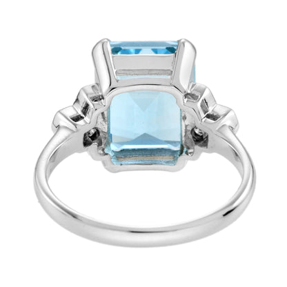 Emerald Cut Blue Topaz &amp; Diamond Solitaire 9K White Gold Ring