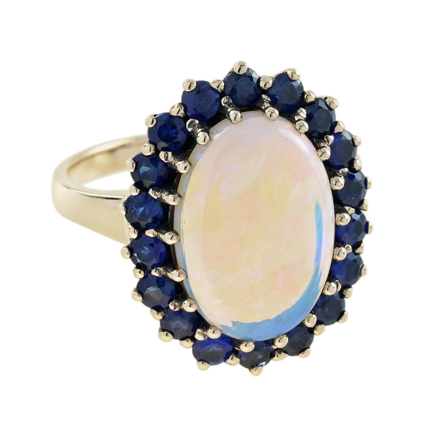 oval white opal with blue sapphire vintage style 9kt yellow gold halo set ring