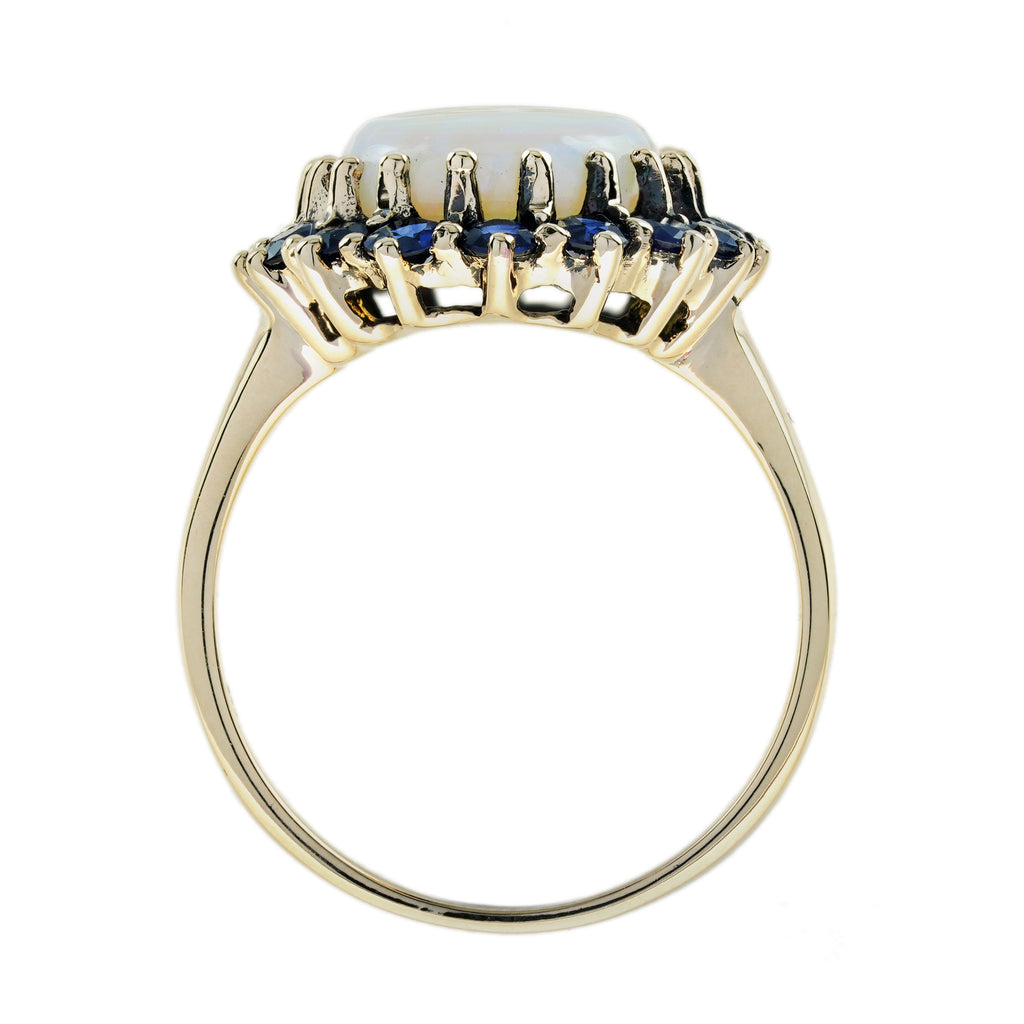 Oval White Opal with Blue Sapphire Vintage Style 9KT Yellow Gold Halo Set Ring