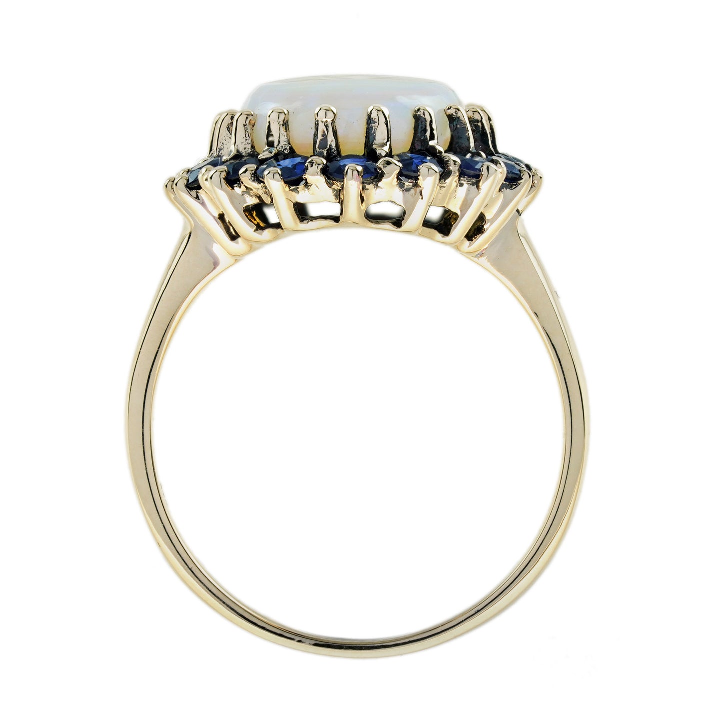 oval white opal with blue sapphire vintage style 9kt yellow gold halo set ring