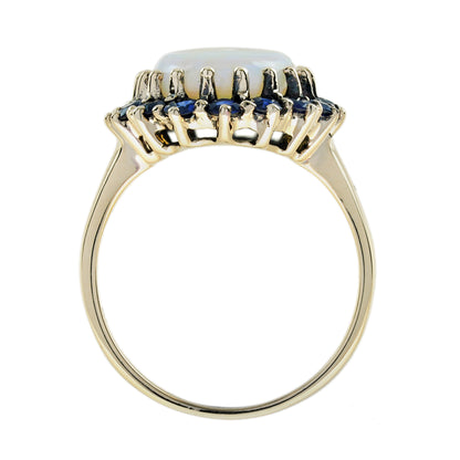 Oval White Opal with Blue Sapphire Vintage Style 9KT Yellow Gold Halo Set Ring