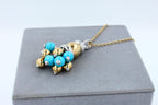 Blue Turquoise Diamonds Golden Sphere Bells Motif Two Tone Gold Pendant Necklace