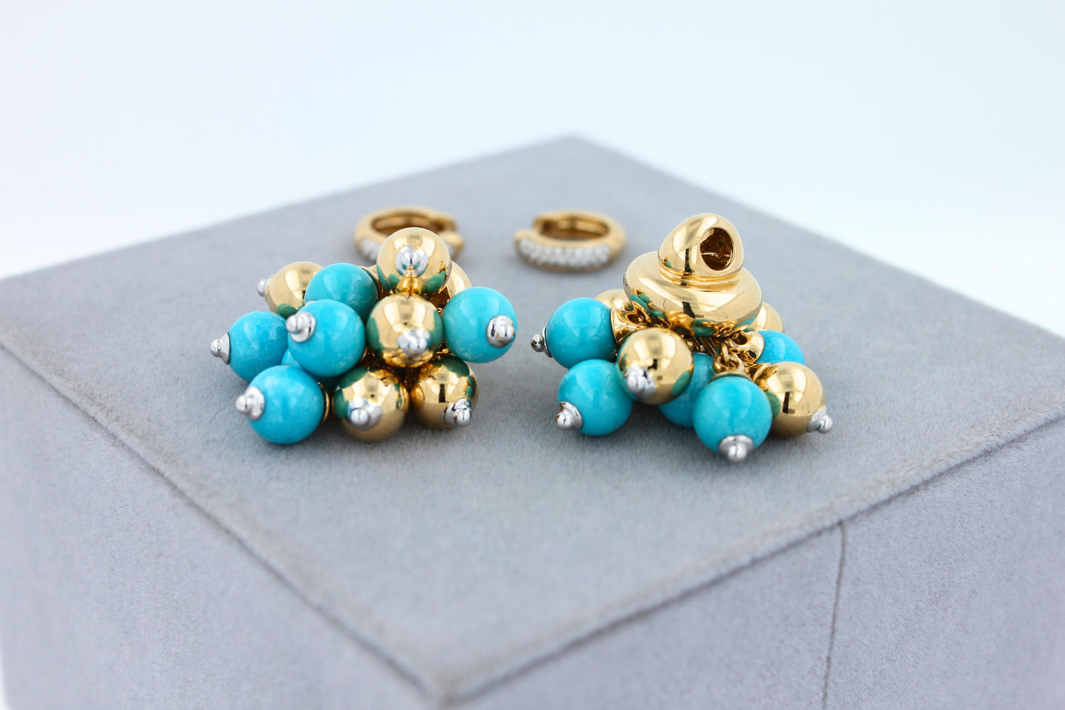 Blue Turquoise Diamonds Golden Sphere Bells Motif Two Tone Gold Huggie Earrings