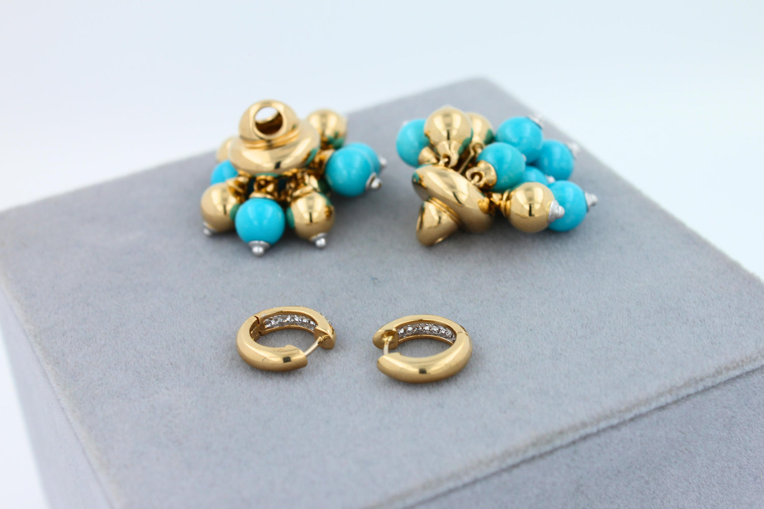 Blue Turquoise Diamonds Golden Sphere Bells Motif Two Tone Gold Huggie Earrings
