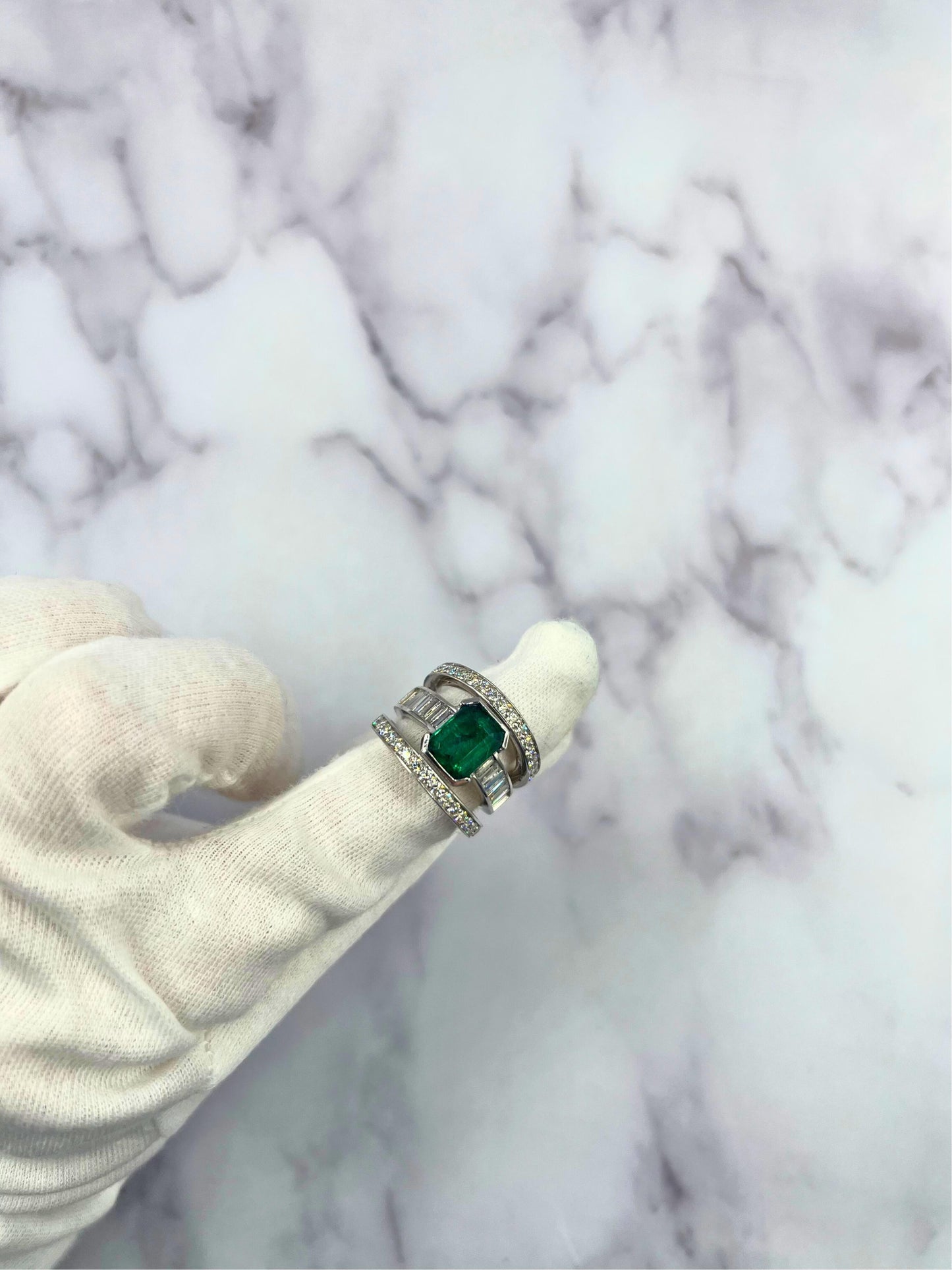 zambian emerald 18 karat white gold full finger bezel diamond baguette rows ring