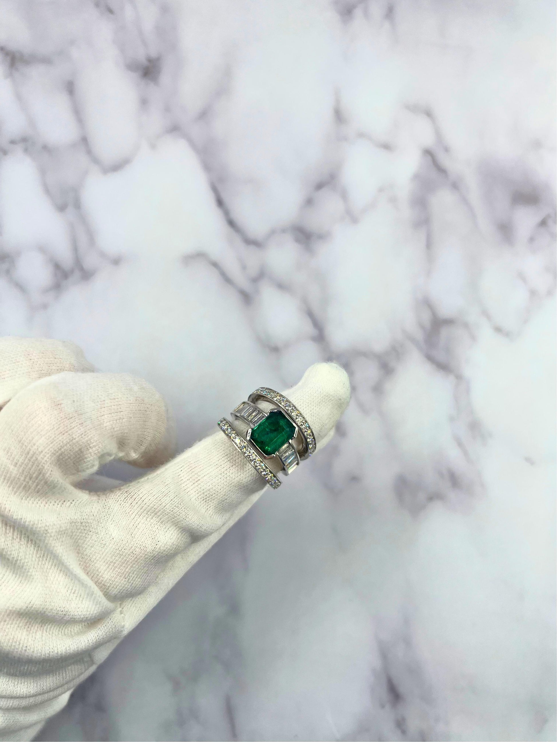 Zambian Emerald 18 Karat White Gold Full Finger Bezel Diamond Baguette Rows Ring