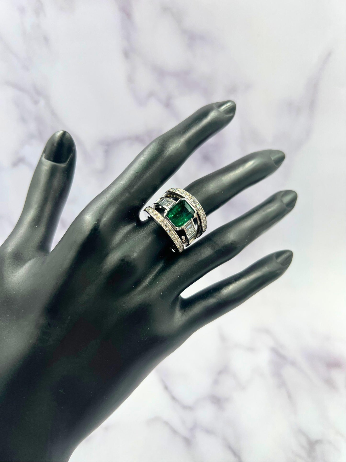 zambian emerald 18 karat white gold full finger bezel diamond baguette rows ring