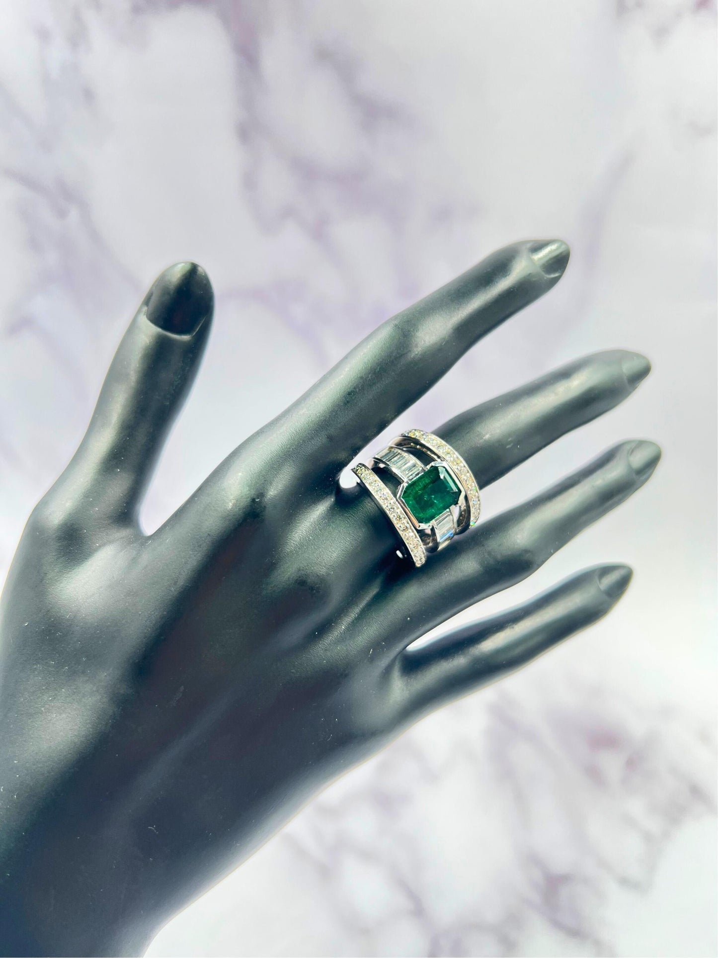 zambian emerald 18 karat white gold full finger bezel diamond baguette rows ring