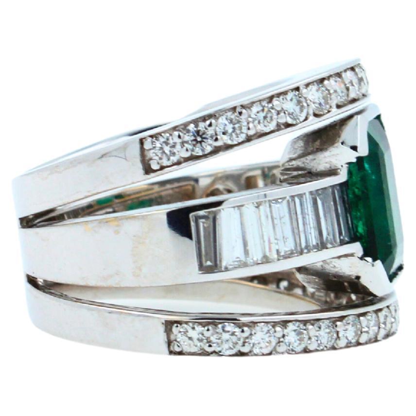 zambian emerald 18 karat white gold full finger bezel diamond baguette rows ring